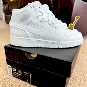 Brand new kids Jordan 1 Mid, have original box, shoes never worn.